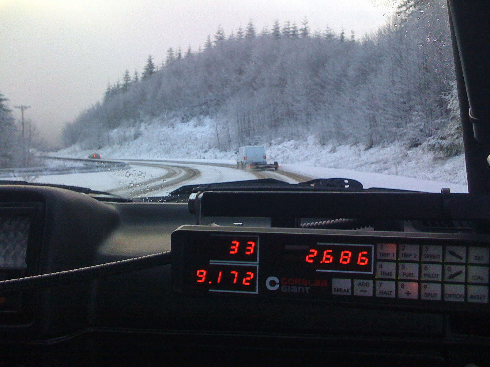 Doo Wop Rally 2009. Fancy odometer in Andrew Lockhart's very nice golf. The snow wasn't very nice, though.<br />03/08/2009 @ 08:58<br />Camera: iPhone
