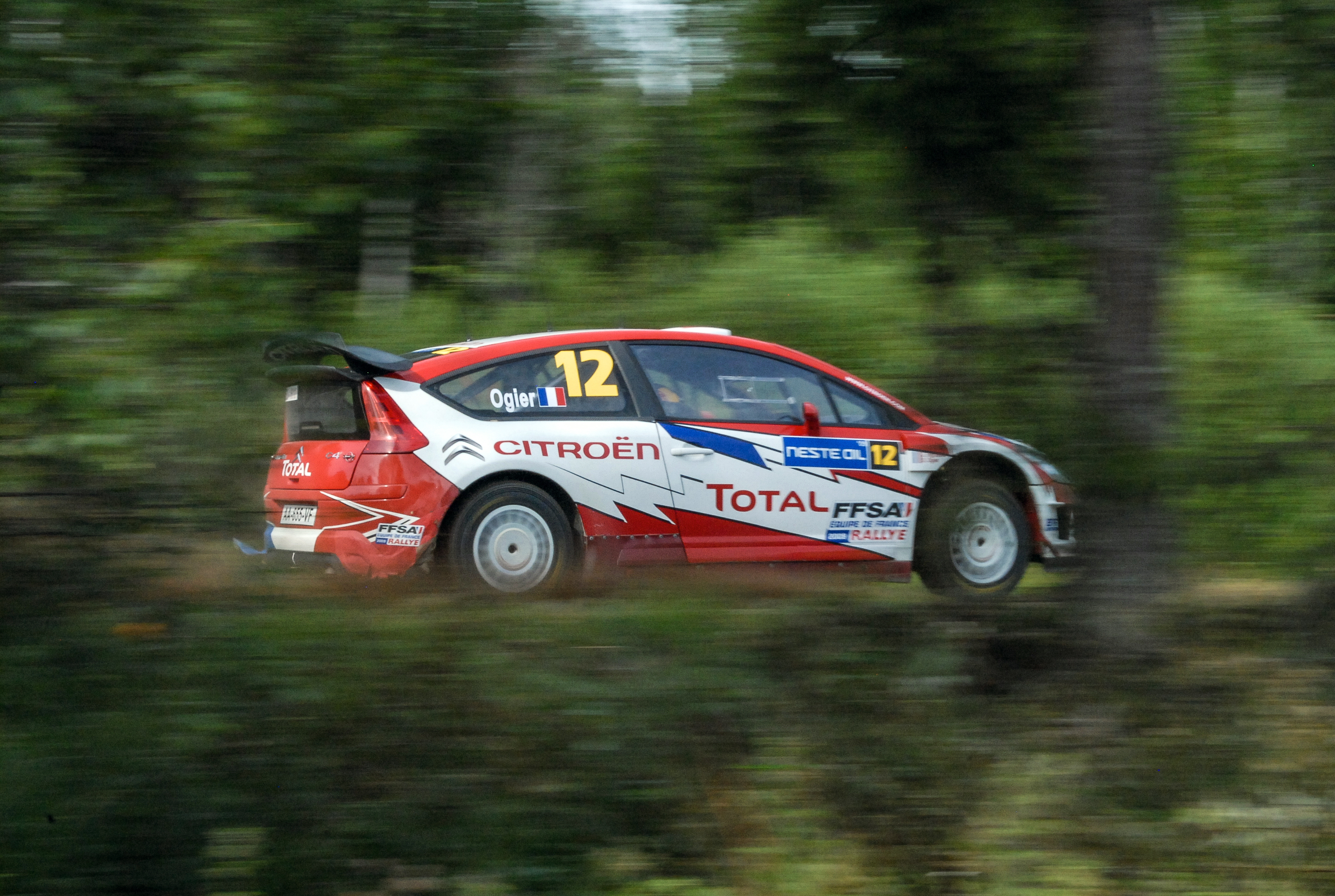 Sebastien Ogier, future World Champion. (Finland Rally 2009)<br />07/31/2009 @ 03:56<br />Camera: NIKON D200<br />Lens: AF-S DX VR Zoom-Nikkor 18-55mm f/3.5-5.6G