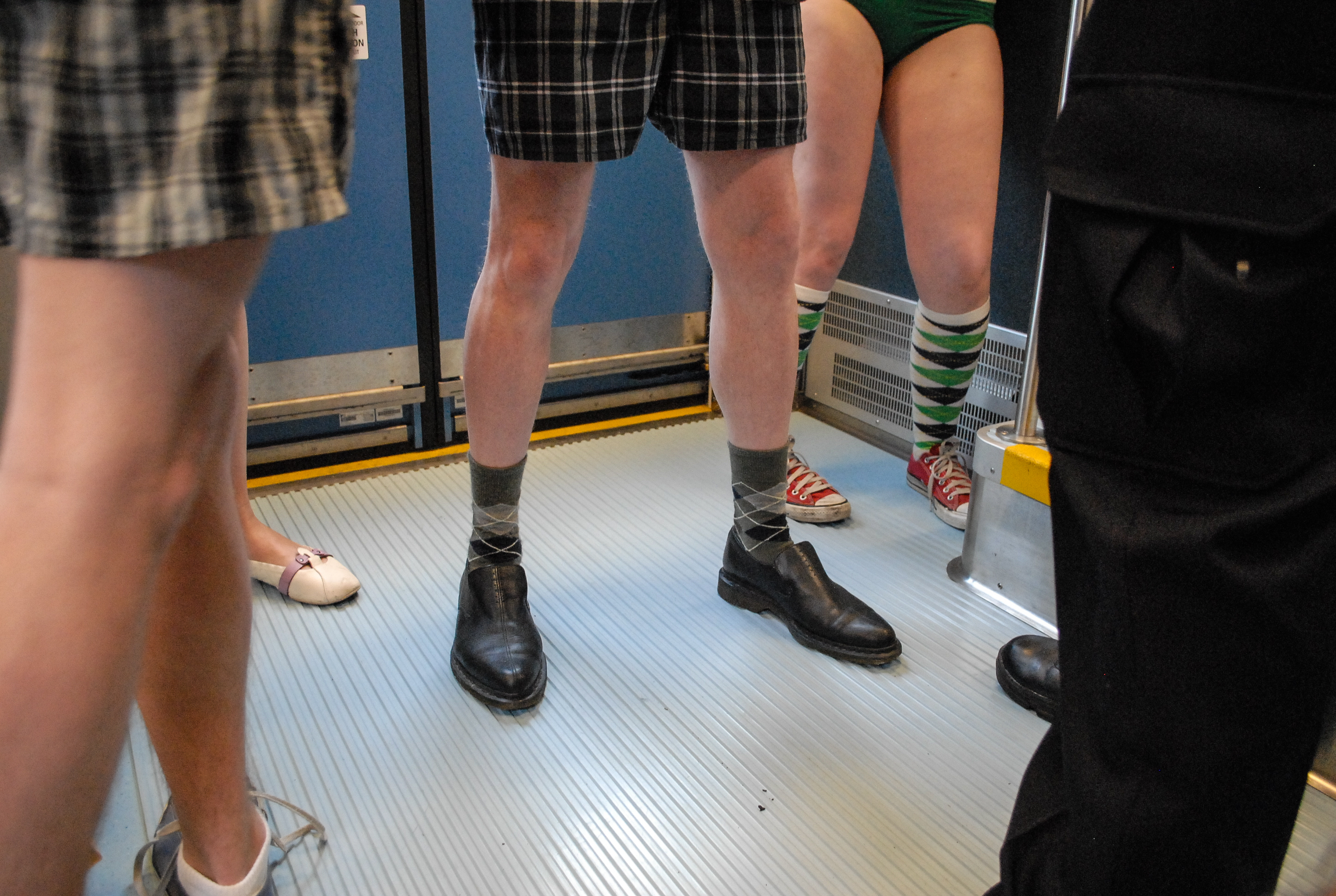 A group decided that we should invade the Seattle light rail, sans-pants. I covered the event as part of my SunBreak gig.<br />01/10/2010 @ 13:49<br />Camera: NIKON D200<br />Lens: AF-S DX VR Zoom-Nikkor 18-55mm f/3.5-5.6G