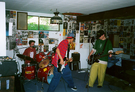 the band practicing in a basement