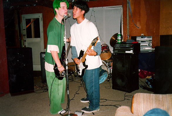 the band playing a show at someone's party
