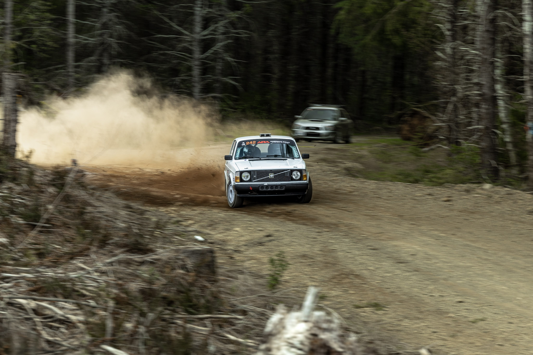 a rally volvo drifts by the camera